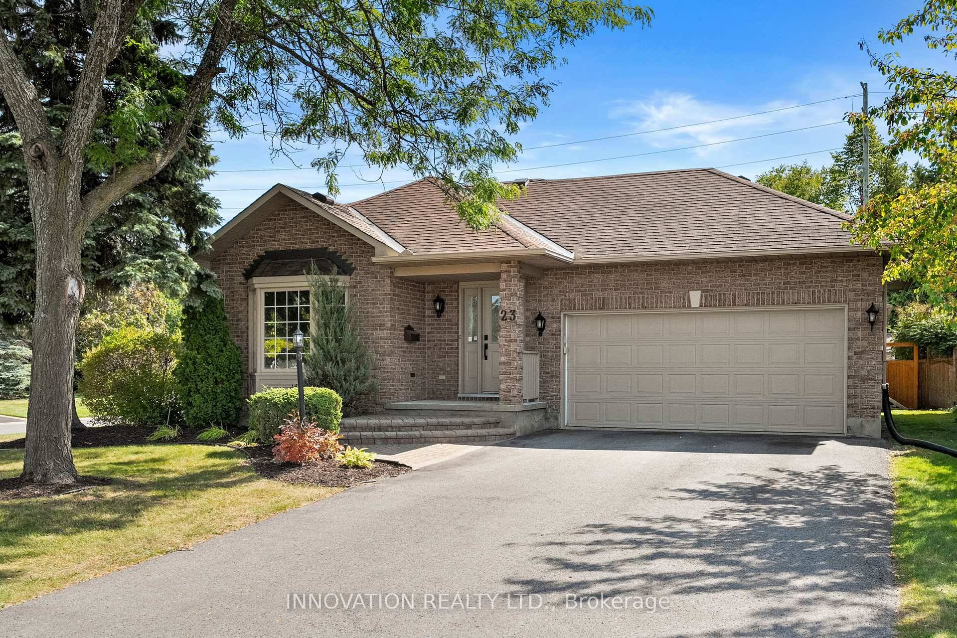 Welcome Home ! 23 Havenwood Trail is an incredibly charming 3 bedroom 3 bath all brick bungalow situated on a beautifully groomed lot in the well sought after Amberwood Village.