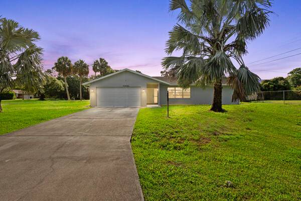 Charming CBS block home on a spacious corner lot in a highly sought after neighborhood.