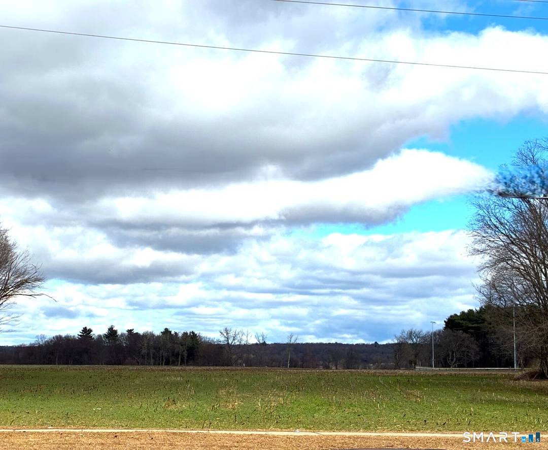 Set in the center of Ellington, this distinctive property offers a rare combination of walkable village location and approximately 16 private acres of beautiful land.