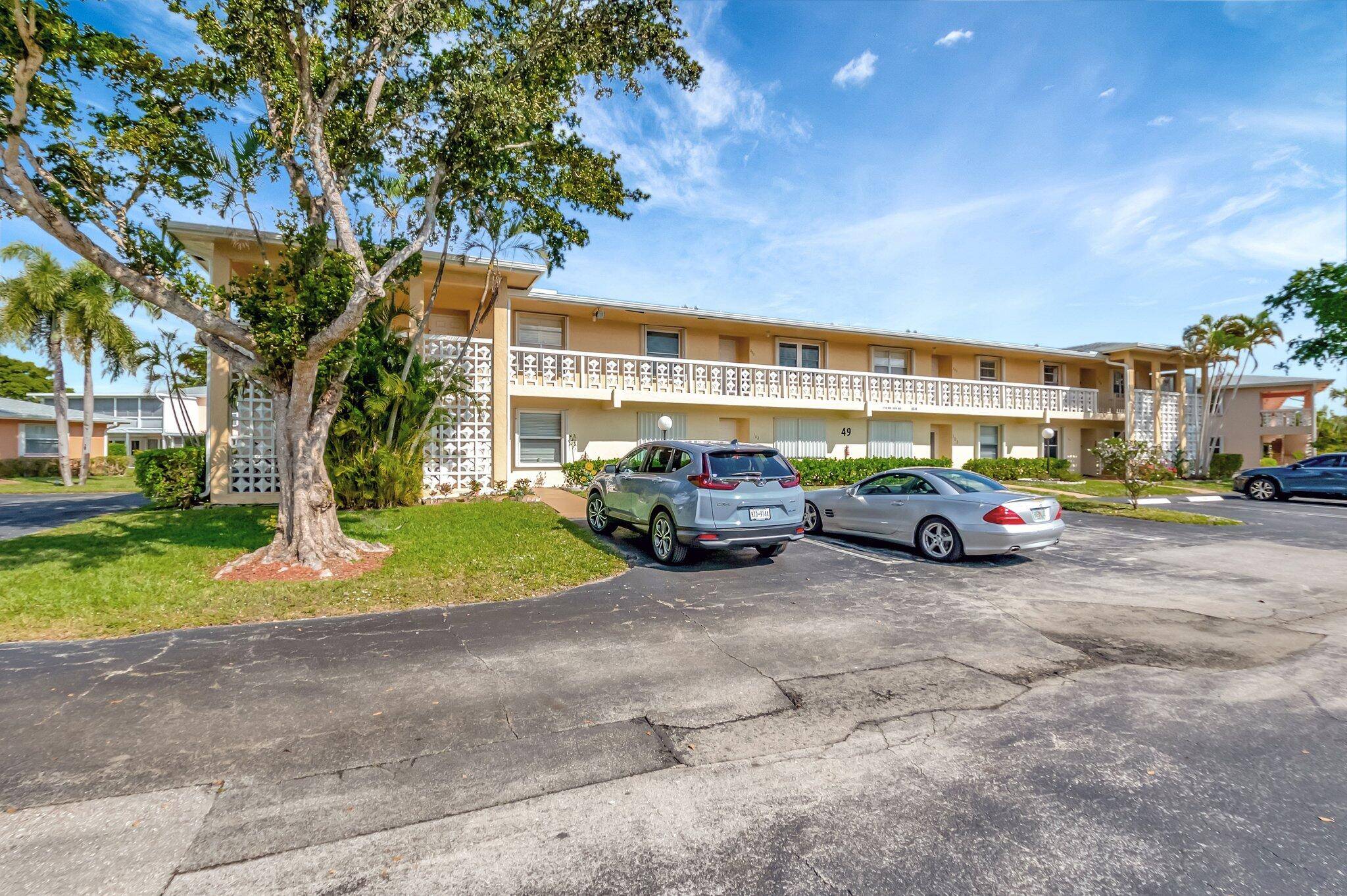 Discover the pinnacle of comfort and sophistication in this fully renovated, deluxe corner 2nd floor condo, ideally situated in the highly desirable, 55 community of Pines of Delray North.