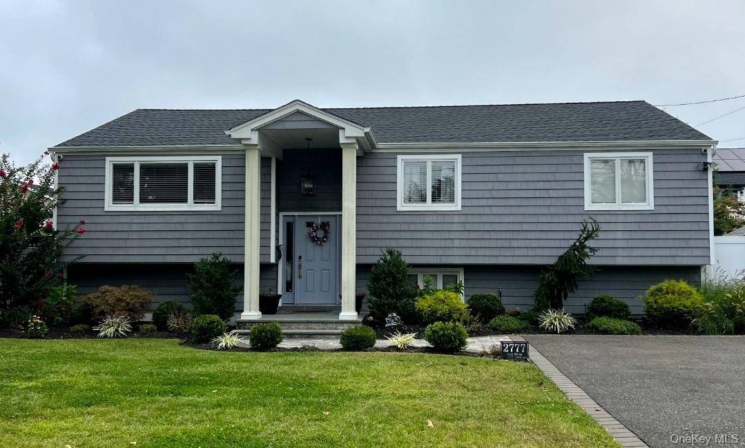 Welcome to this beautifully updated generously sized 4 bedroom, 2 bath high ranch, perfectly combining modern comfort and timeless design.
