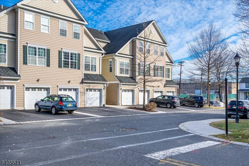 Welcome to 9 Swing Bridge Lane, a beautiful townhome in the desirable Canal Crossing community.