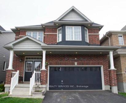 Welcome to 51 Cheevers Road a meticulously updated family home offering four spacious bedrooms, three full bathrooms, a convenient powder room, and an attached double car garage.