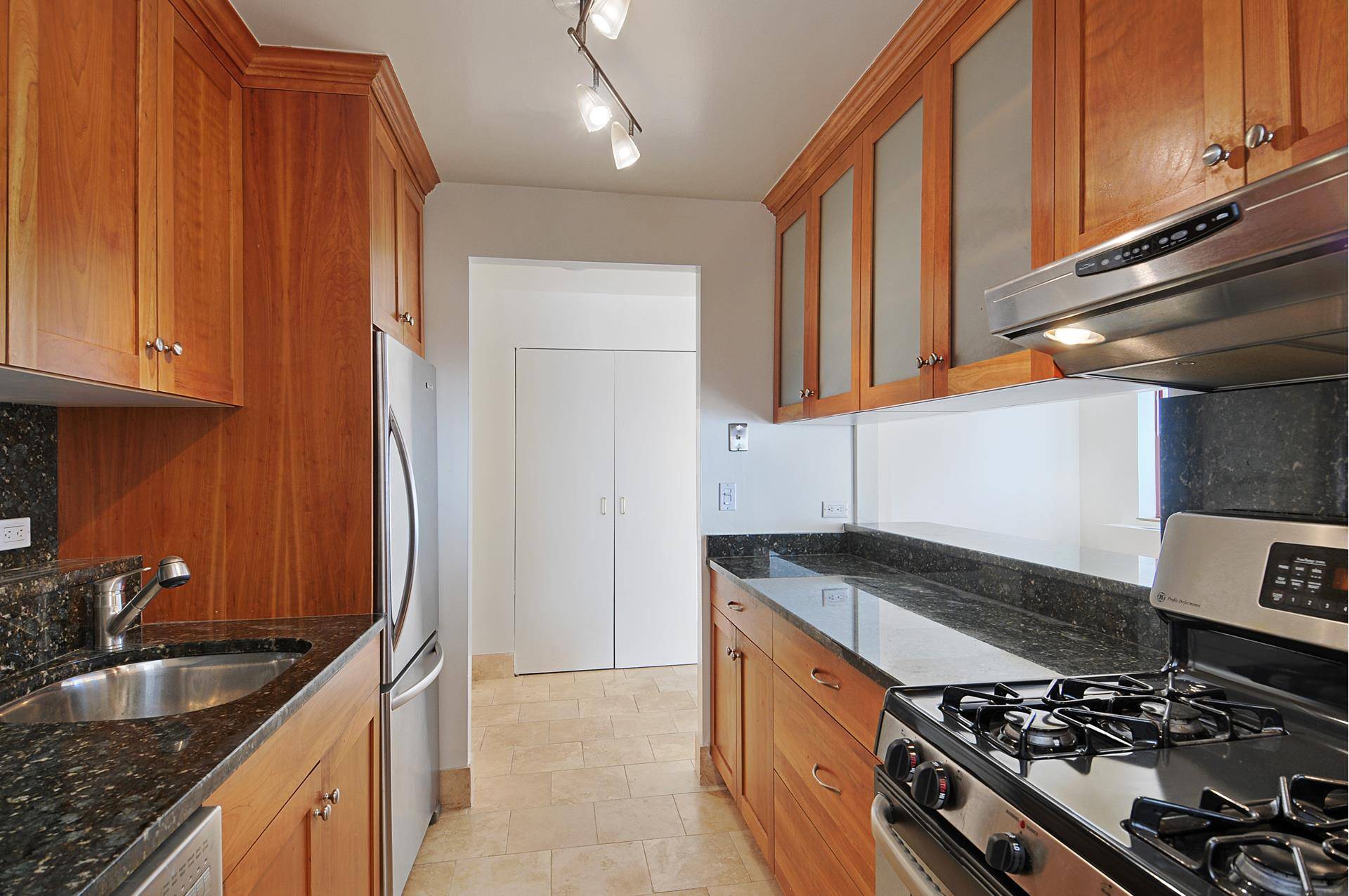 Elegant Sun drenched South facing Two bedroom Two baths home on the 14th floor boasts great light, open city views, high ceilings and Two large balconies.