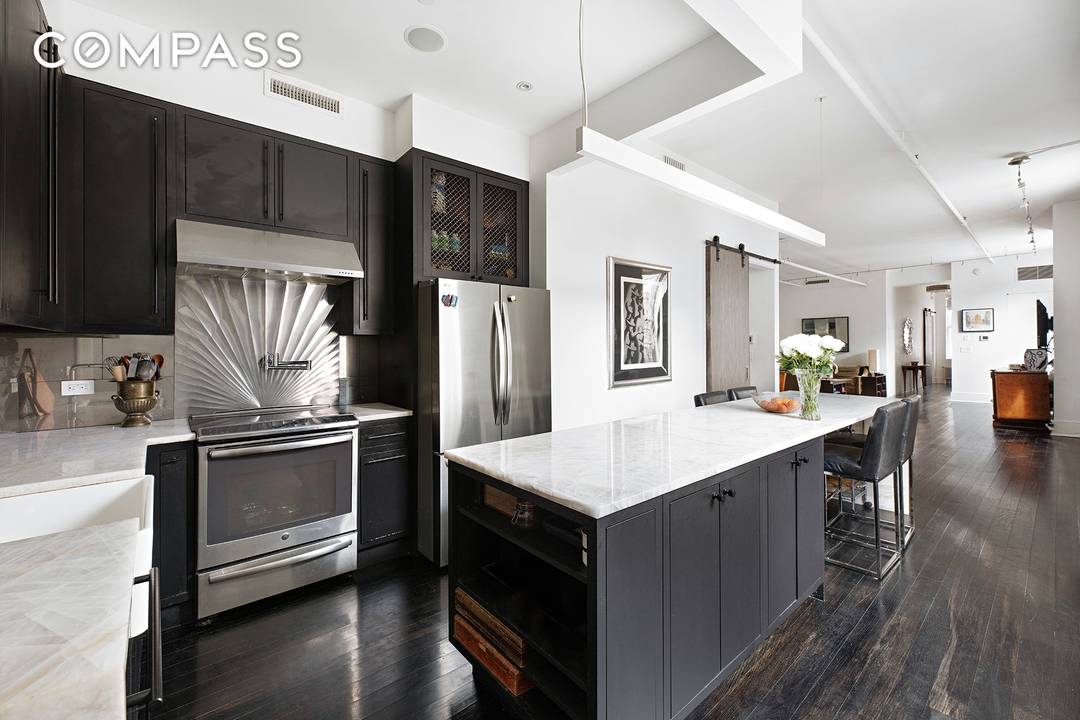 Renovated Condo Loft Two Bedroom Two Bath Library Guest room A keyed elevator opens directly into this beautifully renovated approximately 2, 043 square foot loft featuring soaring 11 foot ceilings, ...