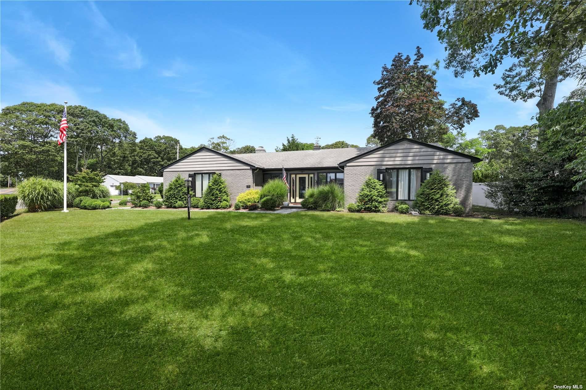 Imagine experiencing the Hamptons at its finest in this charming Westhampton retreat.