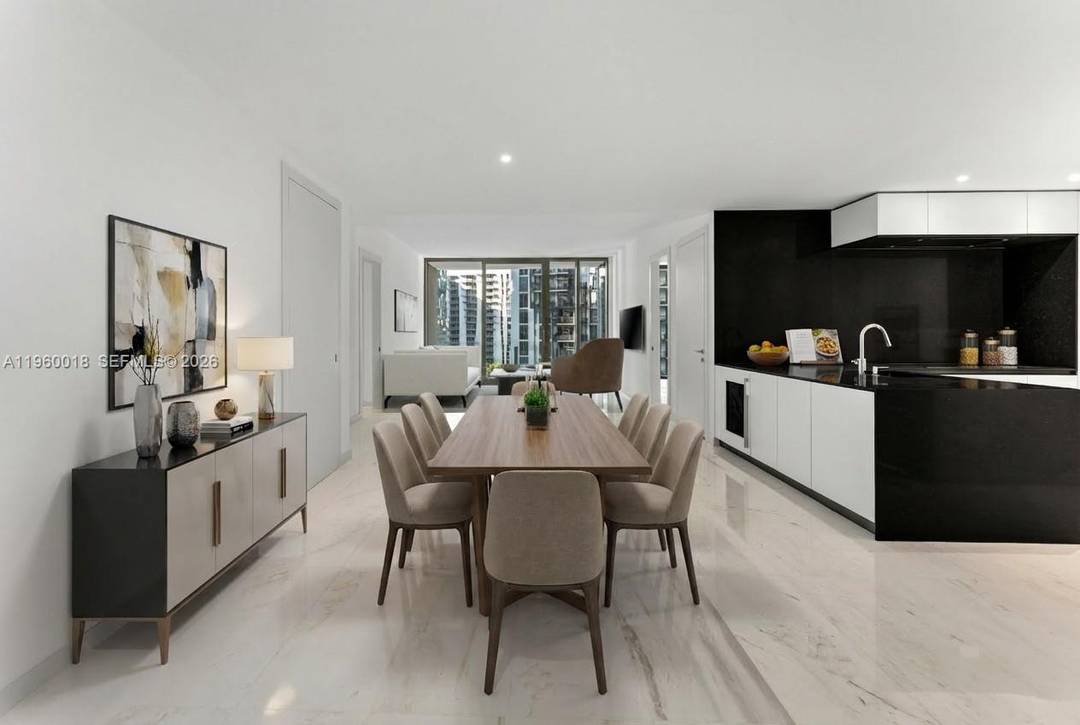 Experience refined waterfront living in the iconic Aston Martin Residences.