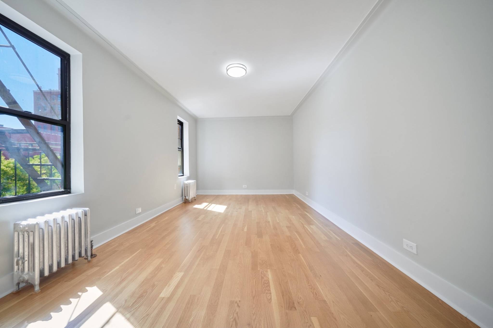 This elegantly renovated 450 sq ft studio blends modern sophistication with historic charm, nestled in a Renaissance style building in Chelseas most vibrant enclave.