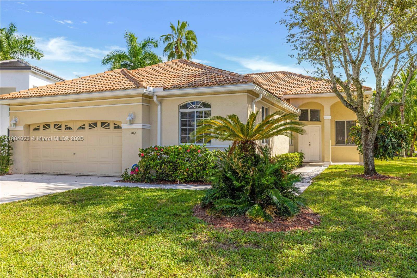 Exquisite corner lot home in the heart of Weston featuring 4 bedrooms, 2.