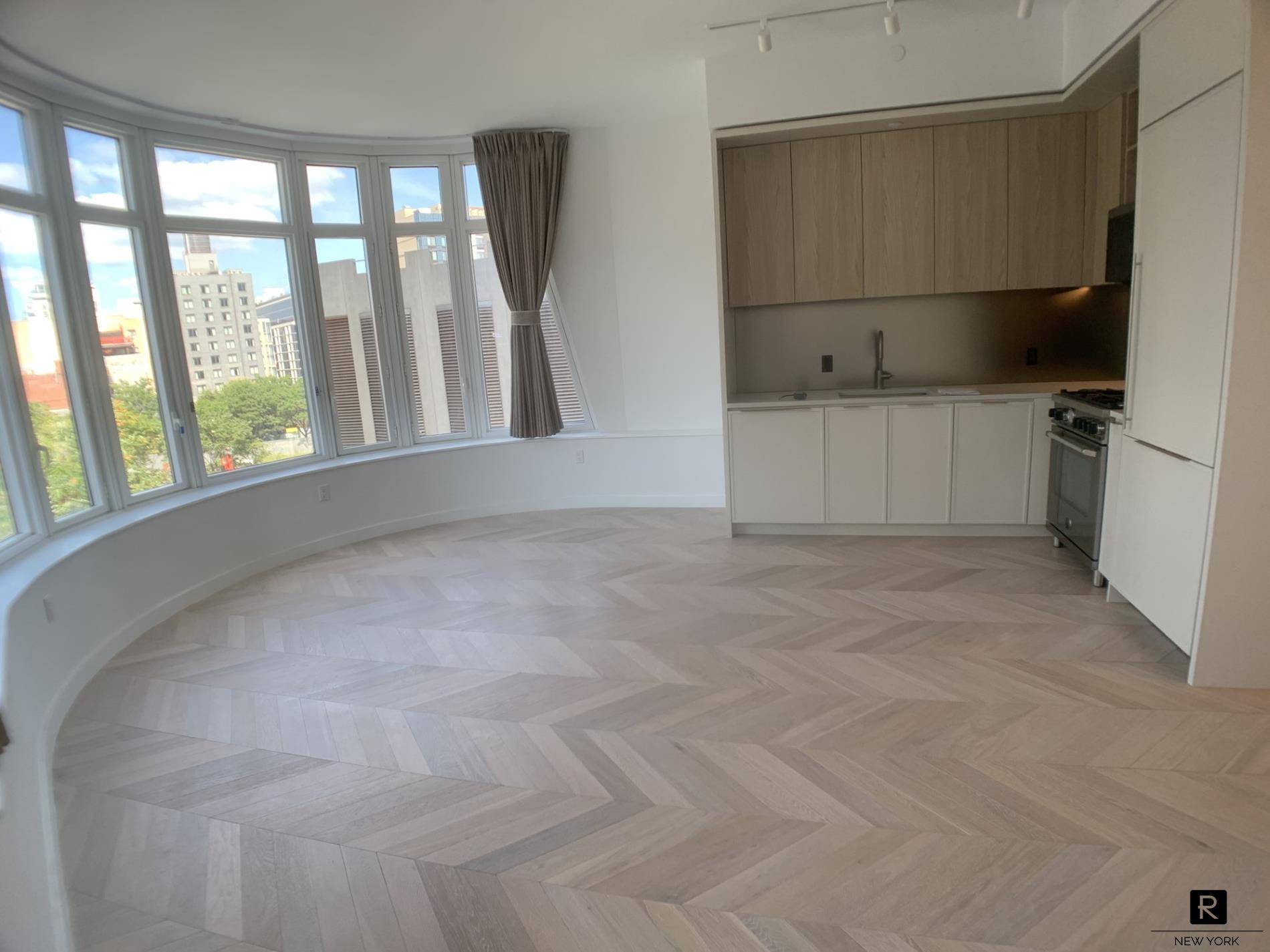 Experience the best of modern city living with this pristine 2 bedroom, 2 bathroom condo in the heart of Long Island City.