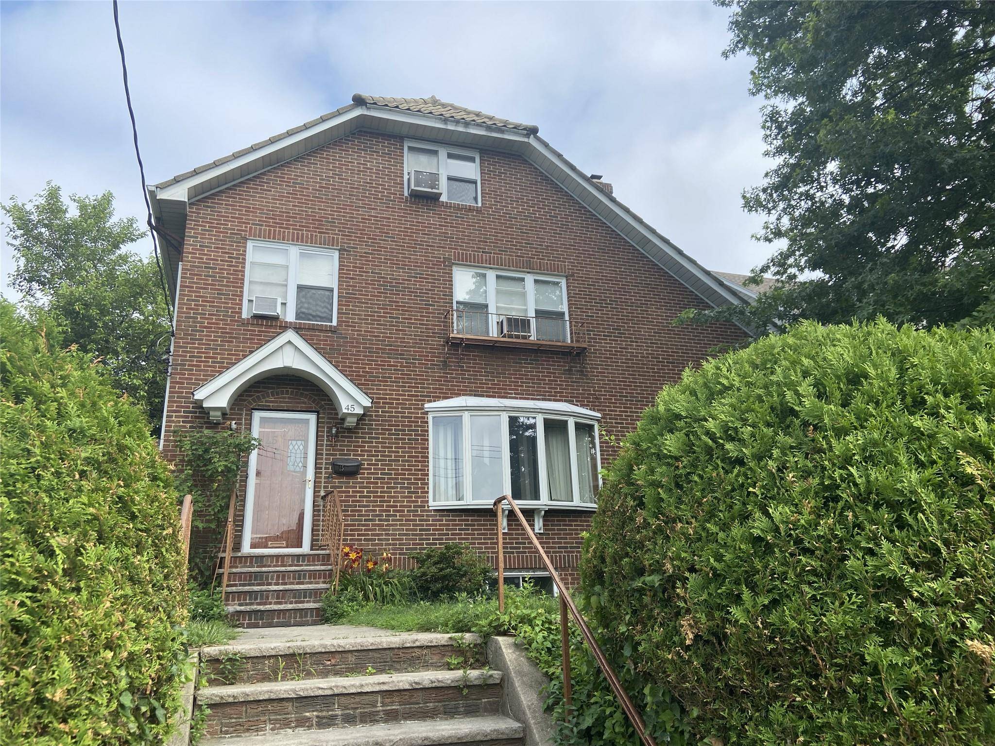 Brick Tudor home in tree lined residential area of New Rochelle conveniently located close to all of your life style needs.