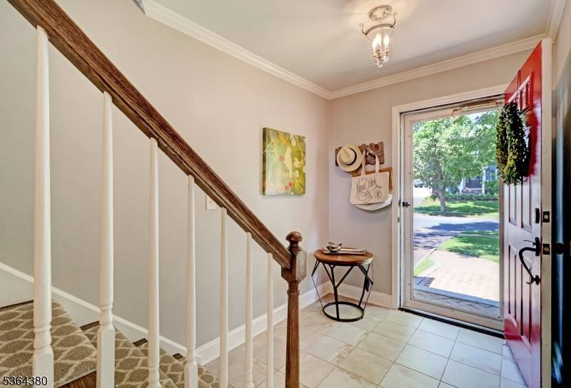 Updated, spacious, and light filled Colonial in a desirable walk to town Chatham Borough location.
