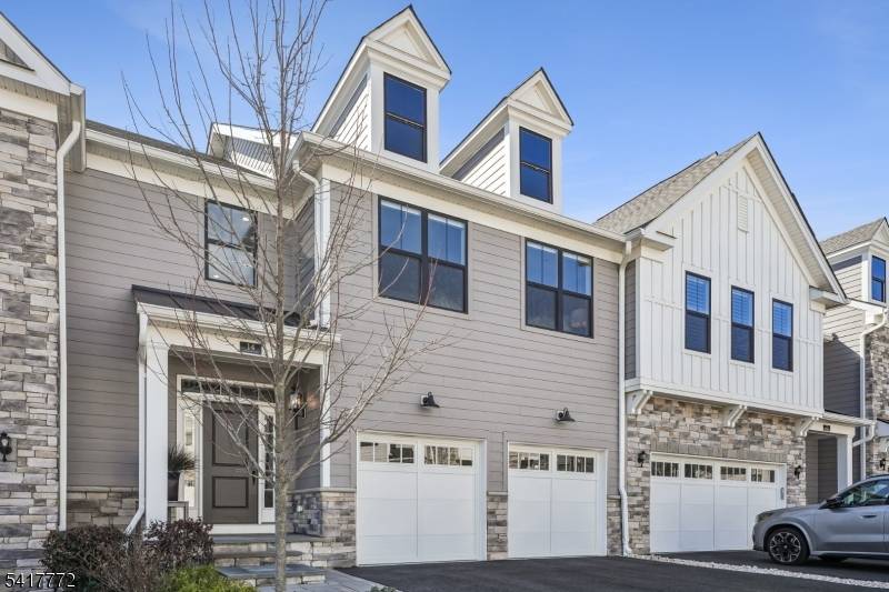 Experience elevated living in this exceptional modern Eldon Model multi level luxury townhouse, offering 3 bedrooms, 3 full bathrooms, and 1 half bath.
