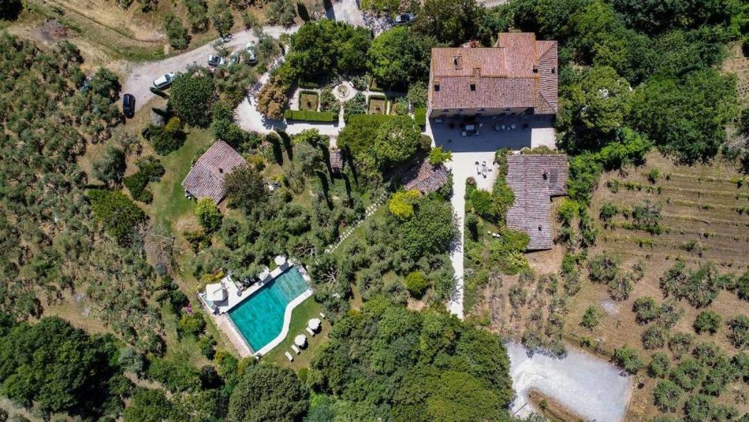 Tuscany real estate. Farm with ancient villa for sale in Montepulciano. Manor with old wine cellars, gardens, vineyards, olive groves, gorgeous pool