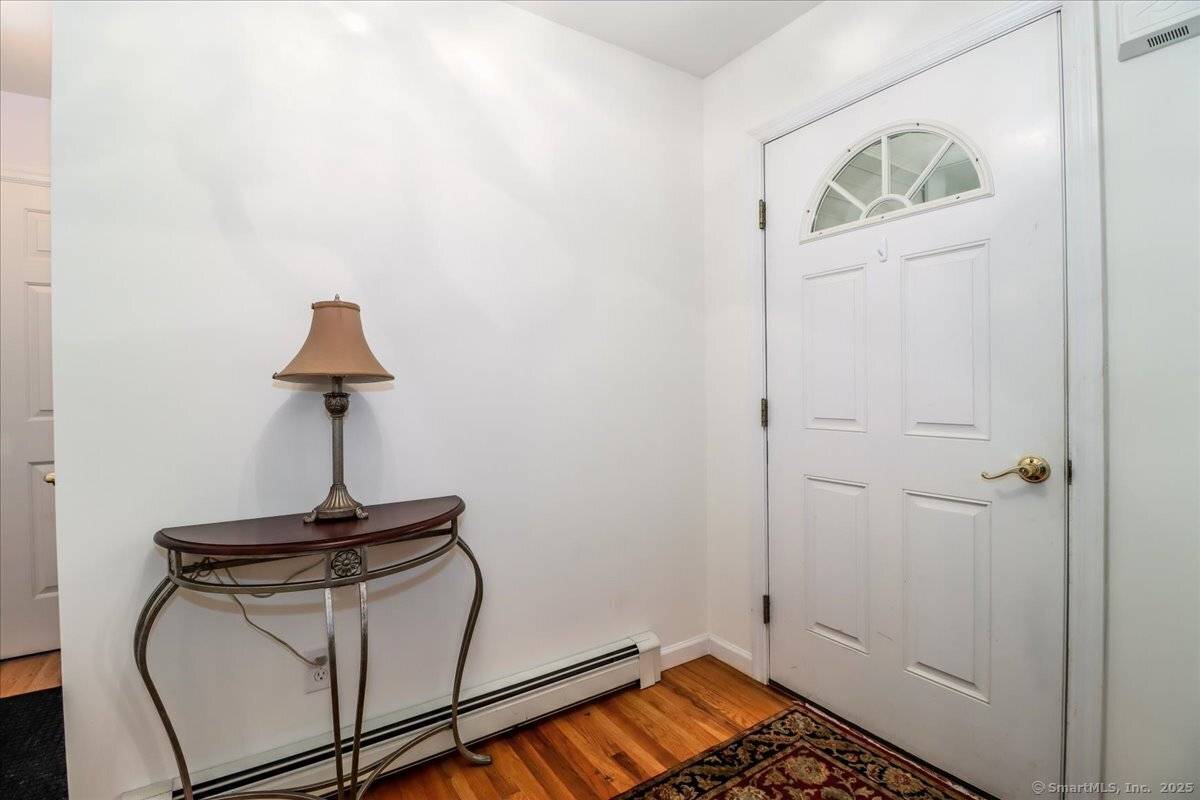 Welcome to this 2002 built Colonial Farmhouse, perfectly situated on a quiet cul de sac in one of the area's most desirable neighborhoods.