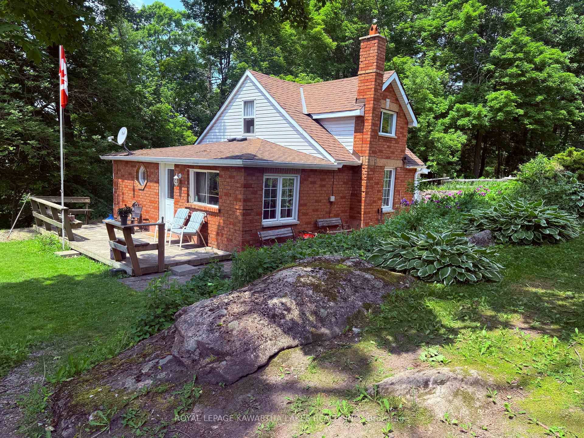 Surrounded by rock gardens, this affordable 2 Bed 1 Bath home, with mf laundry, will please any buyer's budget.