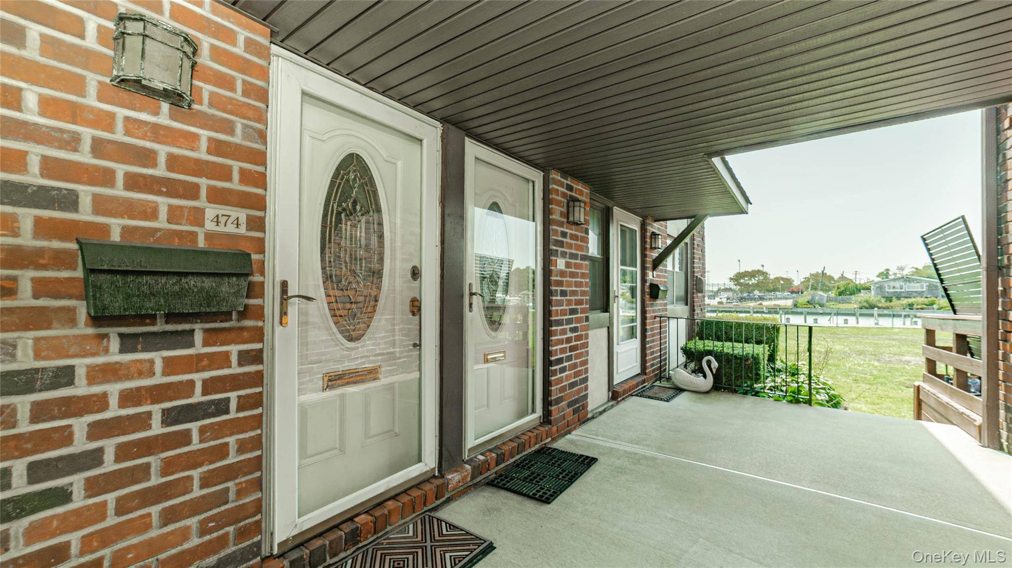 Discover elevated waterfront living at 474 Mariners Way nestled in Copiague's coveted Anchorage community.