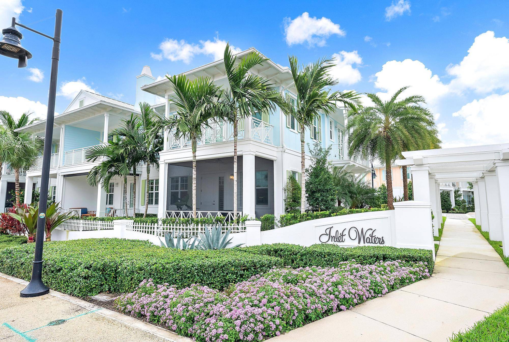 Coastal elegance meets modern luxury at 201 Inlet Waters Circle.