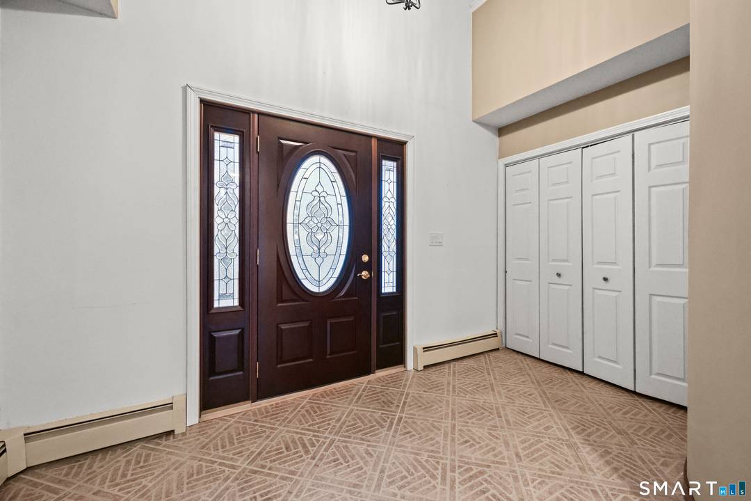 Welcome to 31 Oxford Court in Simsbury, tucked into a highly sought after neighborhood on a quiet cul de sac, set on a private.