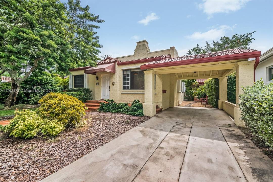 NEW PRICE ! Discover the allure of this lovely Old Spanish Mediterranean home in prime Coral Gables.