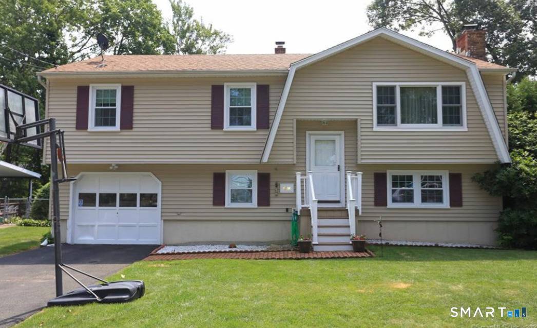 Welcome to 68 Eagle Place, a charming raised ranch tucked away on a quiet residential street in the desirable West Shore section of West Haven.