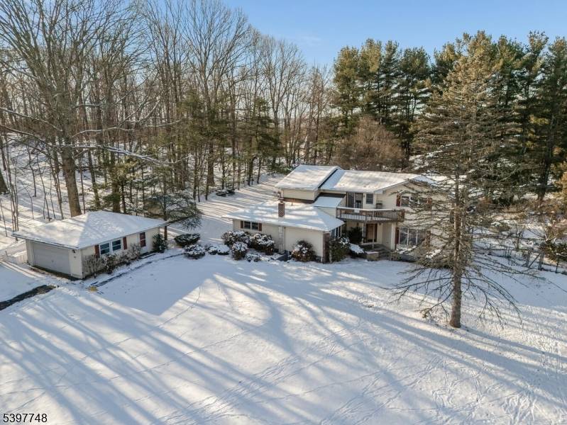 This property combines comfort, and functional living spaces in a serene outdoor setting.