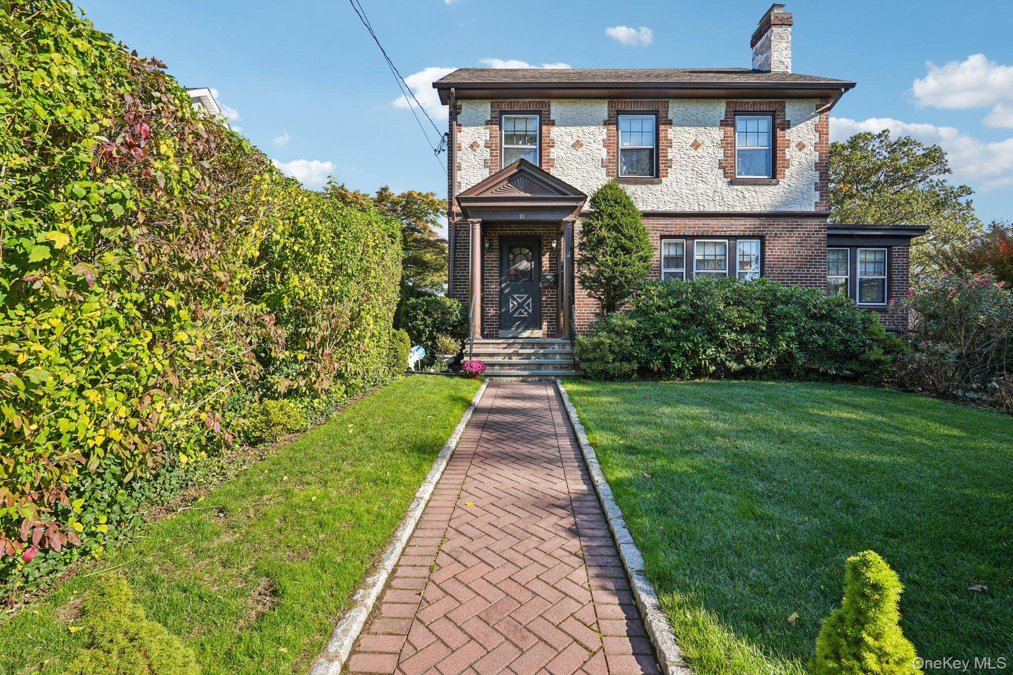 Located in the desirable Mohegan Heights section of Yonkers, this lovely brick and stucco Tudor blends timeless character with classic architectural details.