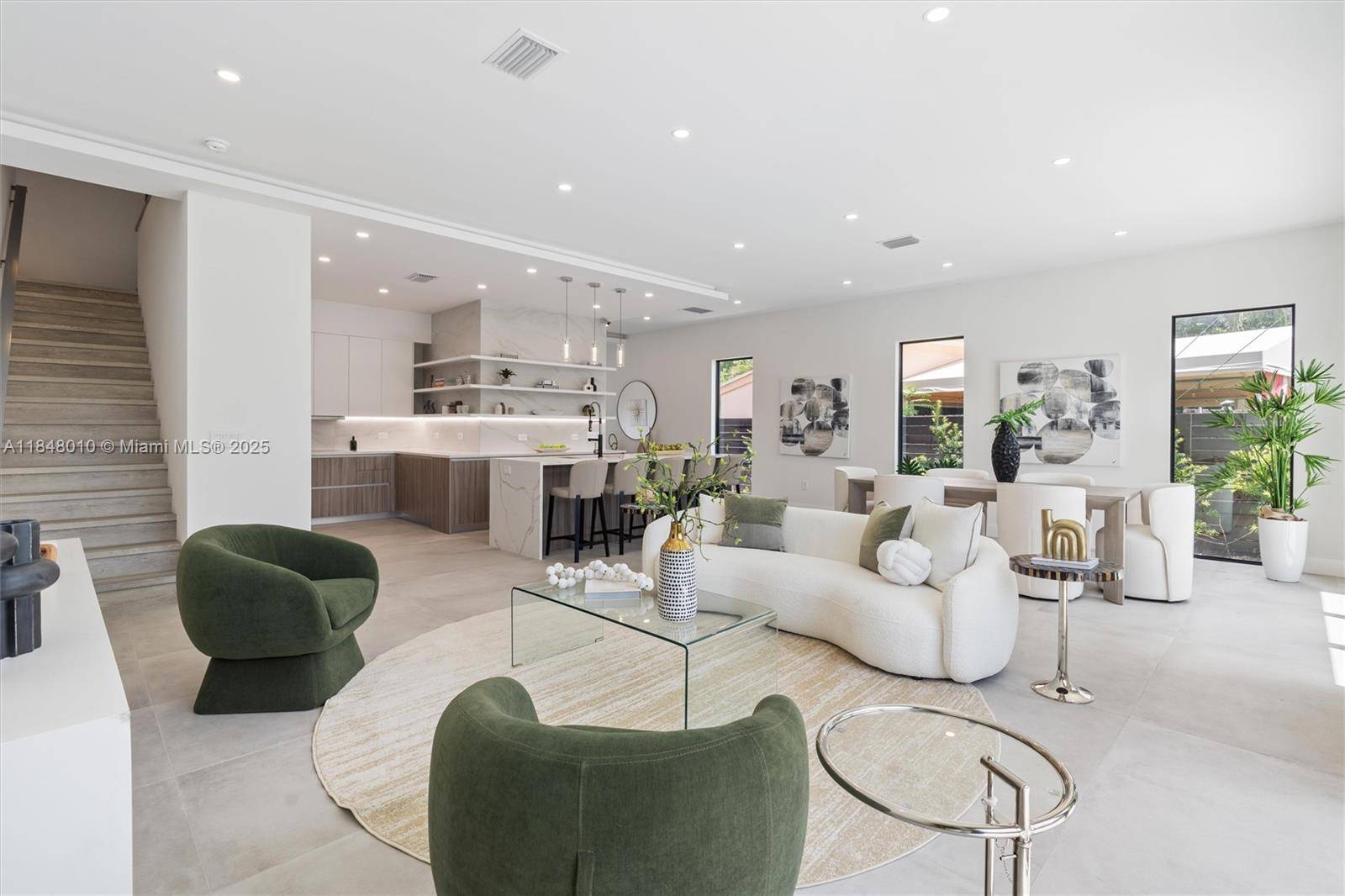 Experience modern living in this elegant Coral Ridge residence, ideally located in the heart of Fort Lauderdale.