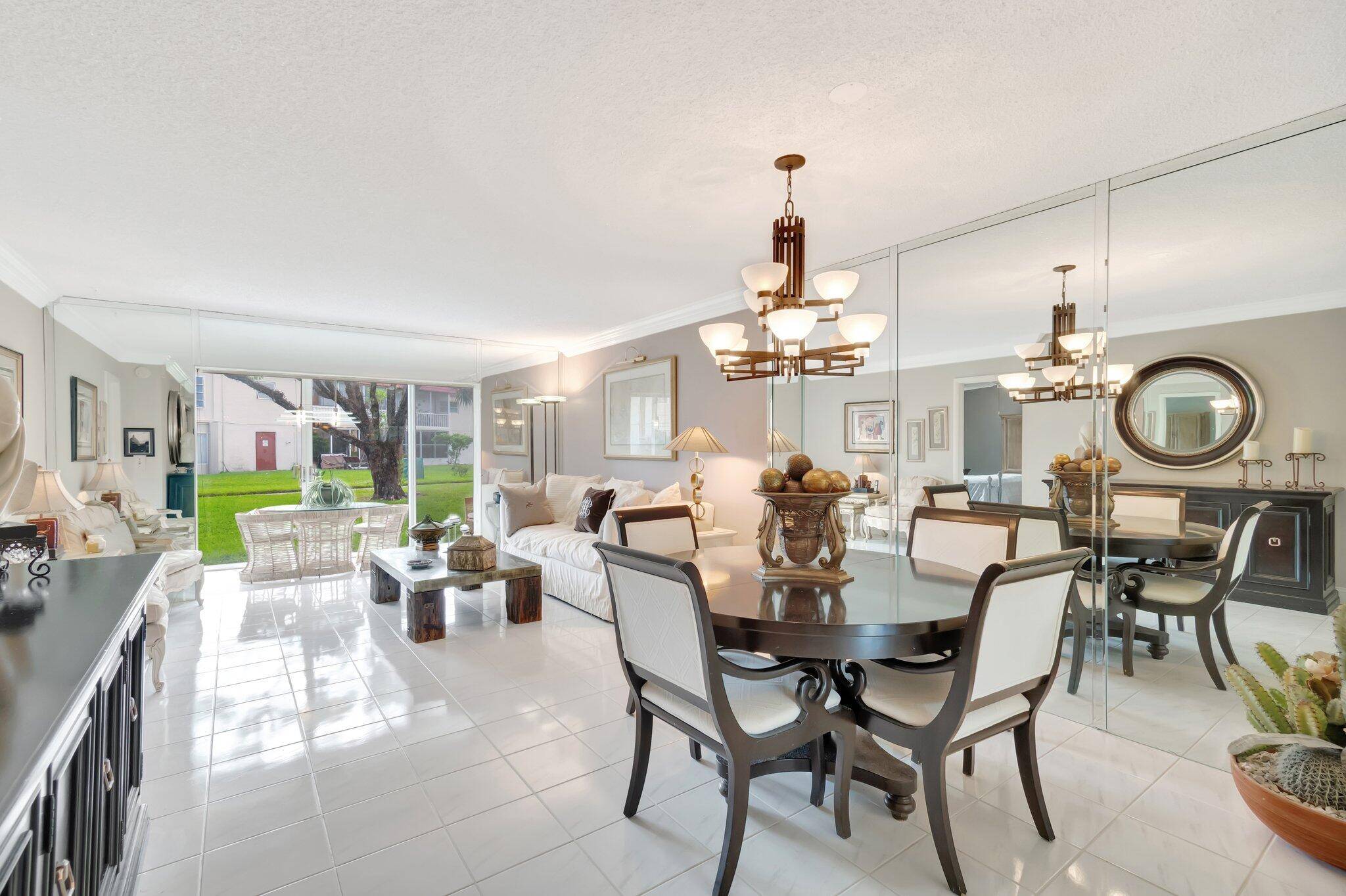 Introducing 33 Abbey Lane,, Unit 103 situated in the Active Adult Community of Abbey Village, nestled in the southeastern nook of the scenic Village of Oriole, Delray Beach, Florida.