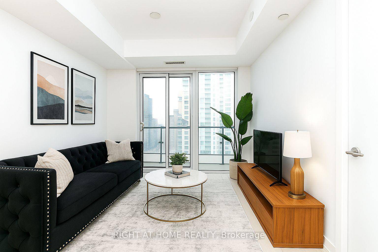 Welcome to this Wheelchair Accessible, 1 Bedroom Den and 2 Bathrooms E2 Condos unit in MidTown Torontos most highly sought after Yonge and Eglinton neighbourhood !