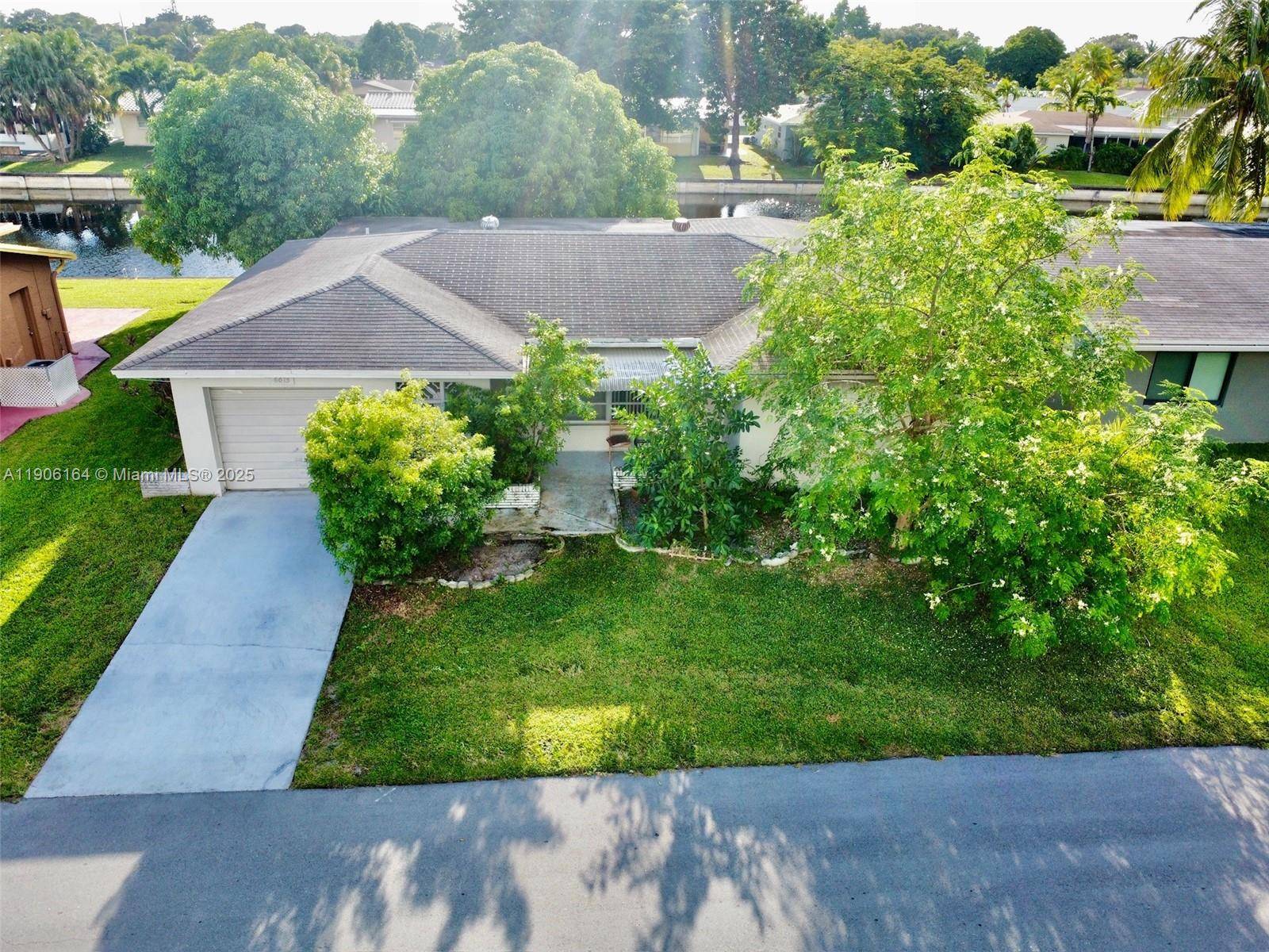 Investor s Dream ! Discover this charming single story 2 bedroom, 2 bath waterfront home with the option to convert the den into a 3rd bedroom.