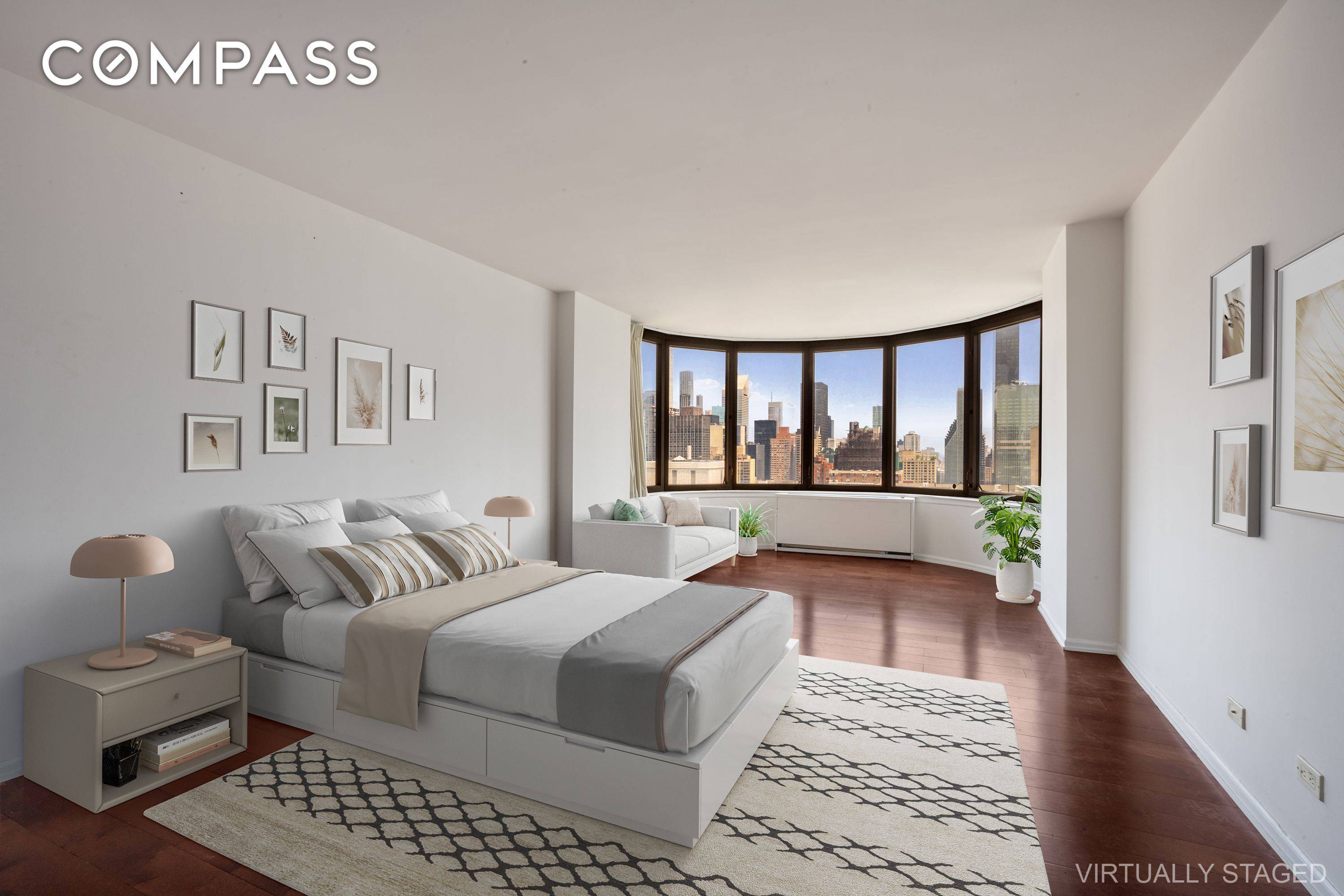 Midtown East studio in a full service doorman condo with spectacular open city and water views.