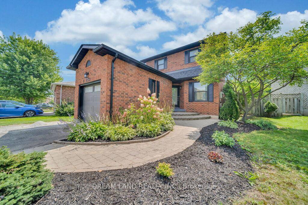 Just unpack and enjoy this recently updated all brick detached open concept home.