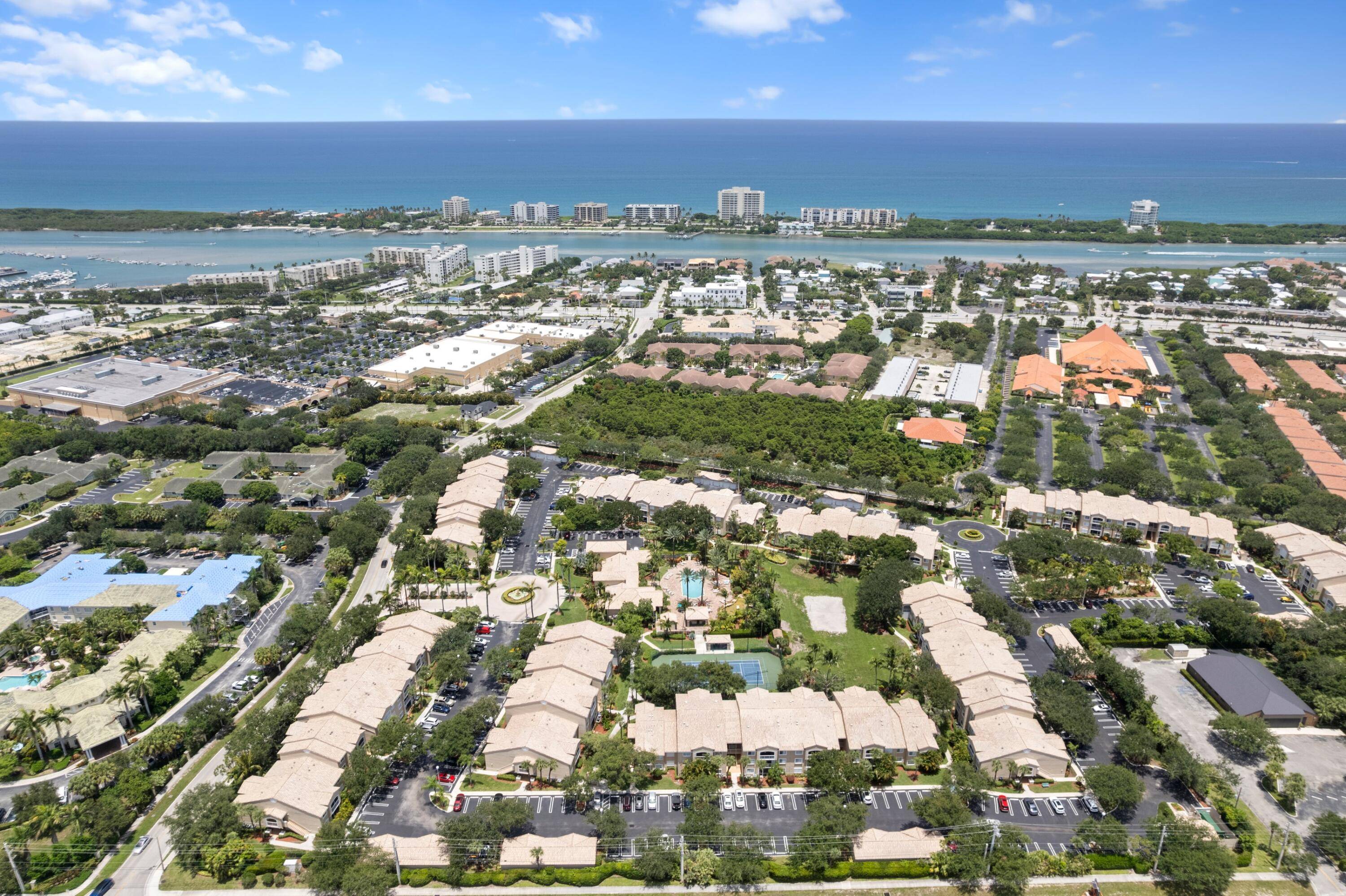 Ground floor two bedroom, two bathroom condo featuring a rarely available one car garage and a screened in patio.