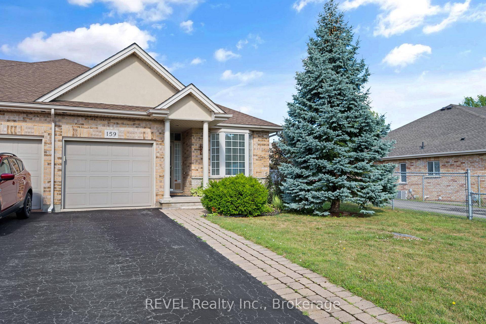 Tucked away on a peaceful dead end street, this beautifully maintained bungalow style end unit townhome offers stylish comfort and practical convenience in an ideal location.