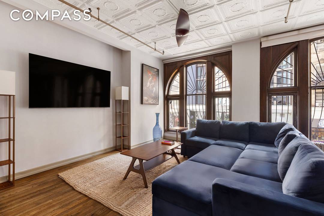 Own an authentic Chelsea loft in the heart of the historic Flower District.