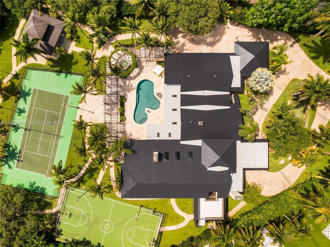 Indulge in a private Miami resort lifestyle at the Farmer Road Estate, a gated 2.