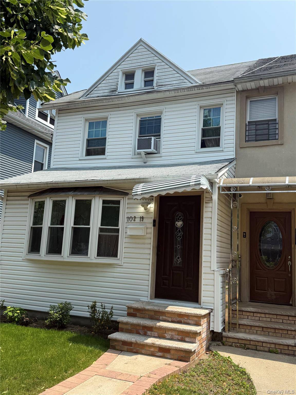 Semi attached colonial with 4 bedroom and 2 full bath.