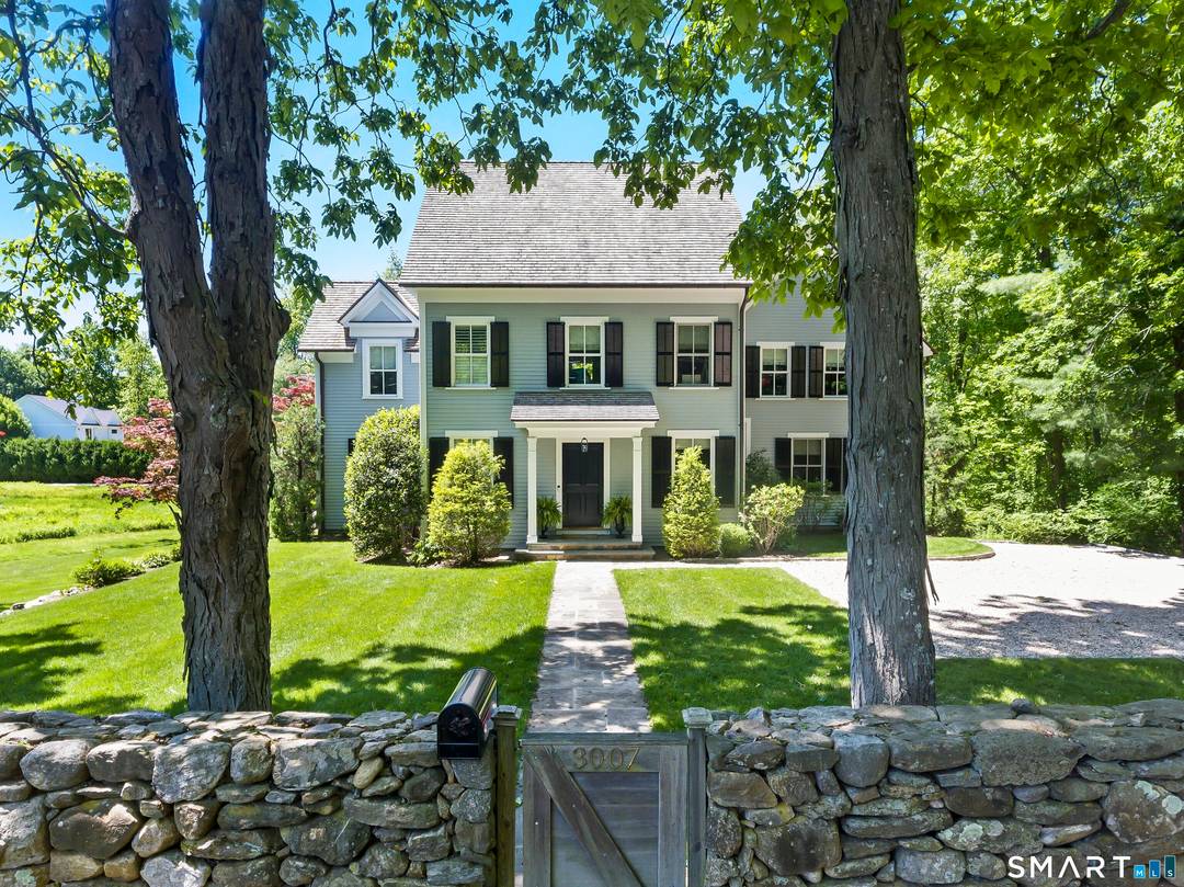 A gorgeous Farmhouse Colonial tucked away on 2 picturesque acres minutes to Fairfield Westport town await.