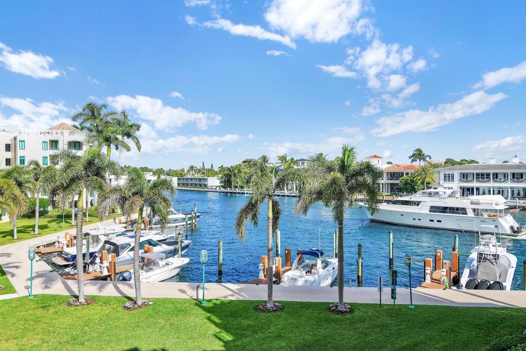 Pet Friendly Waterfront residence in the highly sought after, gated enclave of Mizner Village, located on the exclusive grounds of The Boca Raton Resort Club Membership not included.