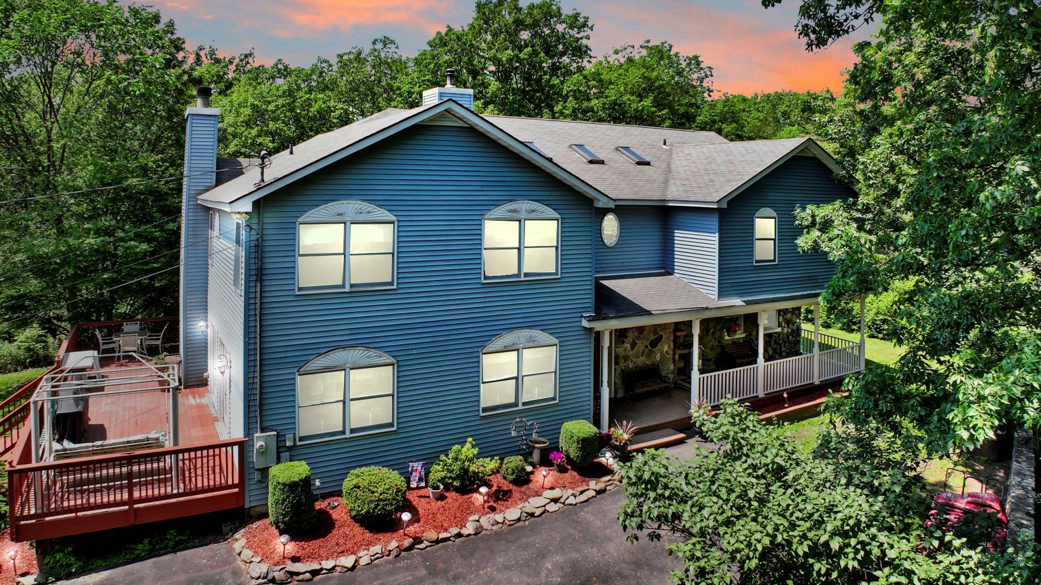 Welcome to 65 Oxford Springs Road, Chester, NY, a one of a kind custom built Country Contemporary home perfectly set on a private 2.