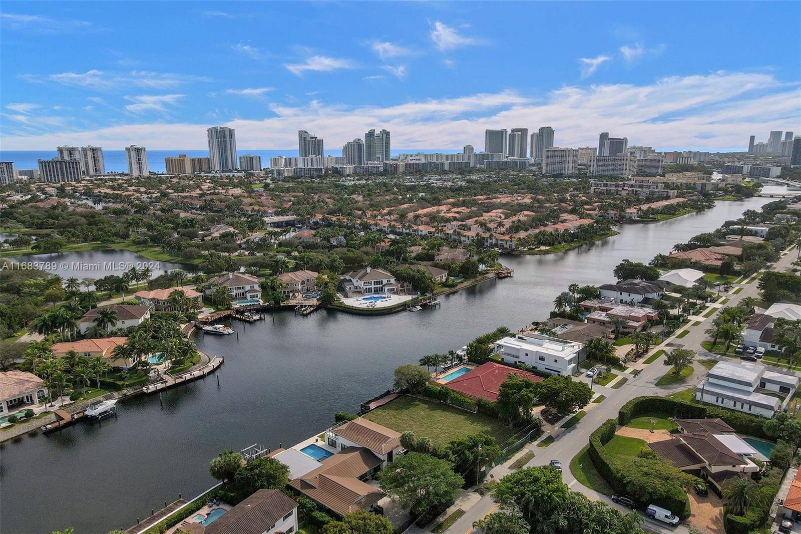 Don t miss out on this striking waterfront land, perfect for avid boaters, tennis players, and golfers !