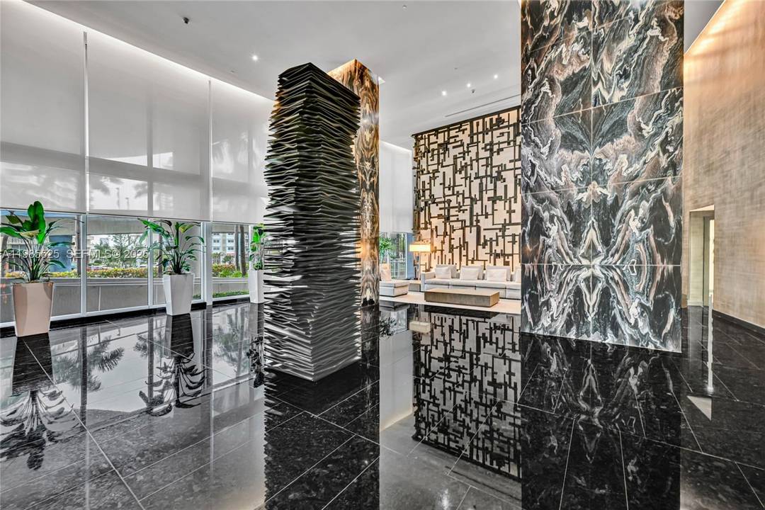 Beautiful high floor 2 bedroom den, 3 bath condo in the heart of Hallandale Beach, offering 1, 571 sq.