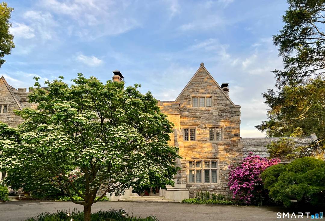 A rare opportunity to live in a granite and limestone estate of historic significance, just moments from the heart of downtown New Canaan.