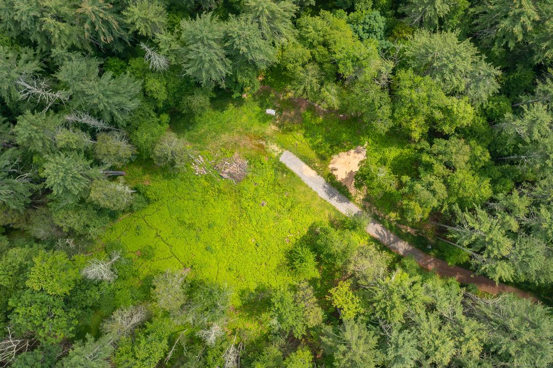 Tucked away off a peaceful country road in the charming hamlet of Cornwall Bridge, Connecticut, this secluded 19 acre parcel offers a rare opportunity to create a private haven in ...