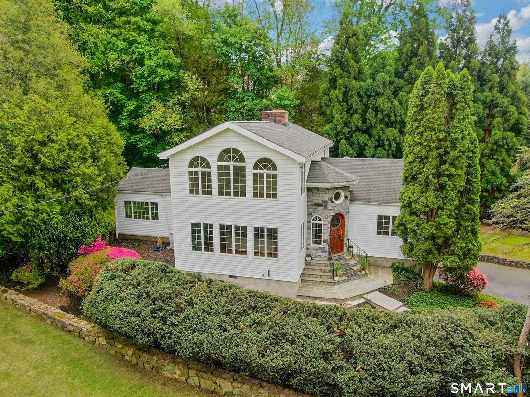 Privately nestled on 1. 76 exceptional acres in a coveted Westover setting, 450 Westover Road is a sophisticated retreat offering remarkable privacy, scale, and timeless appeal.