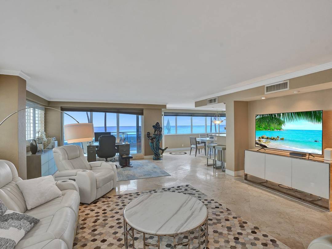 Oceanfront first floor NE corner unit with direct beach access.