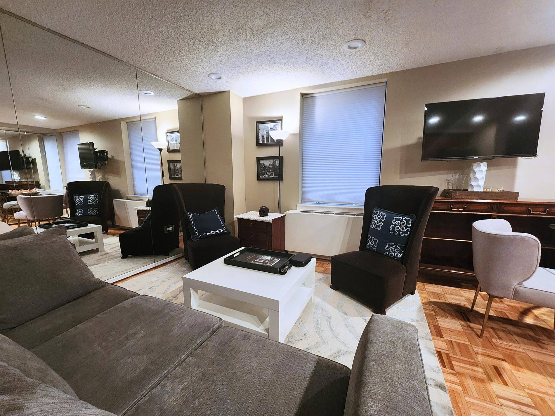 Immerse yourself in the convenience and luxury that New York has to offer by making this unique one bedroom residence at the vibrant art deco Executive Plaza condominium your new ...