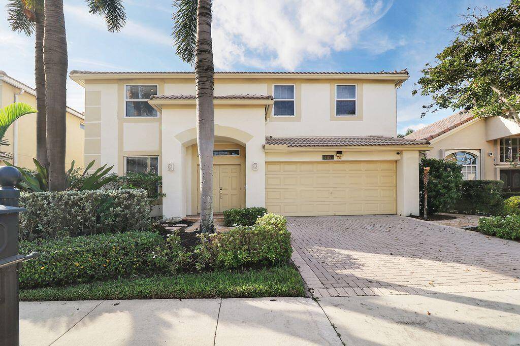 Upgraded interior features and a lakefront golf course view are the highlights of this spacious home in desirable gated Avondale, where you're central to all WPB has to offer.