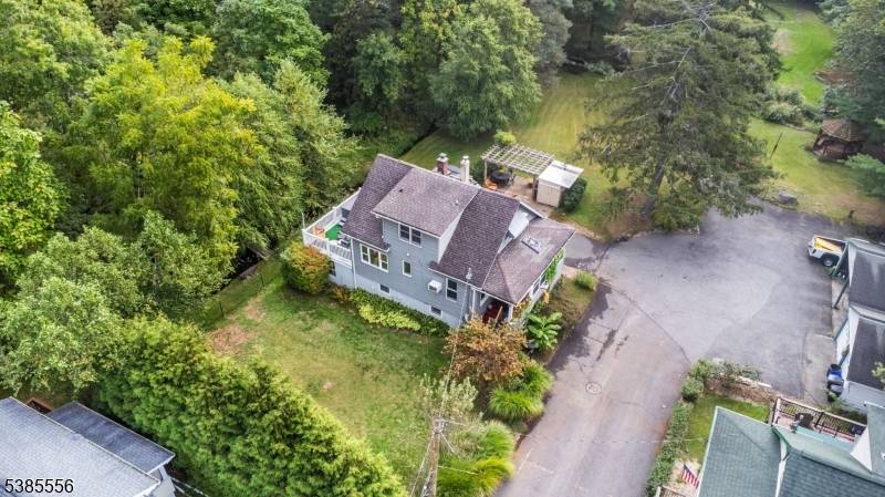 Nature Lover's Dream Home on Expansive Lot Backing to Woodland.